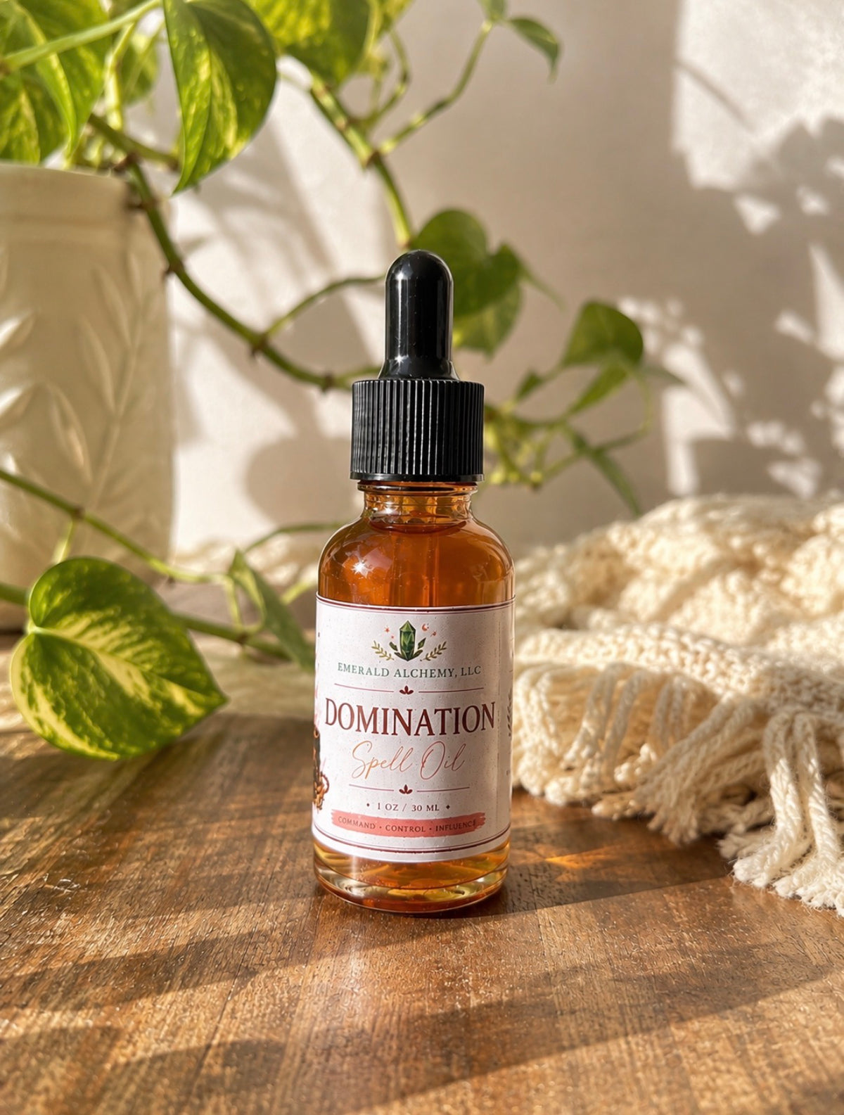 Domination spell oil in a 1 oz glass dropper bottle