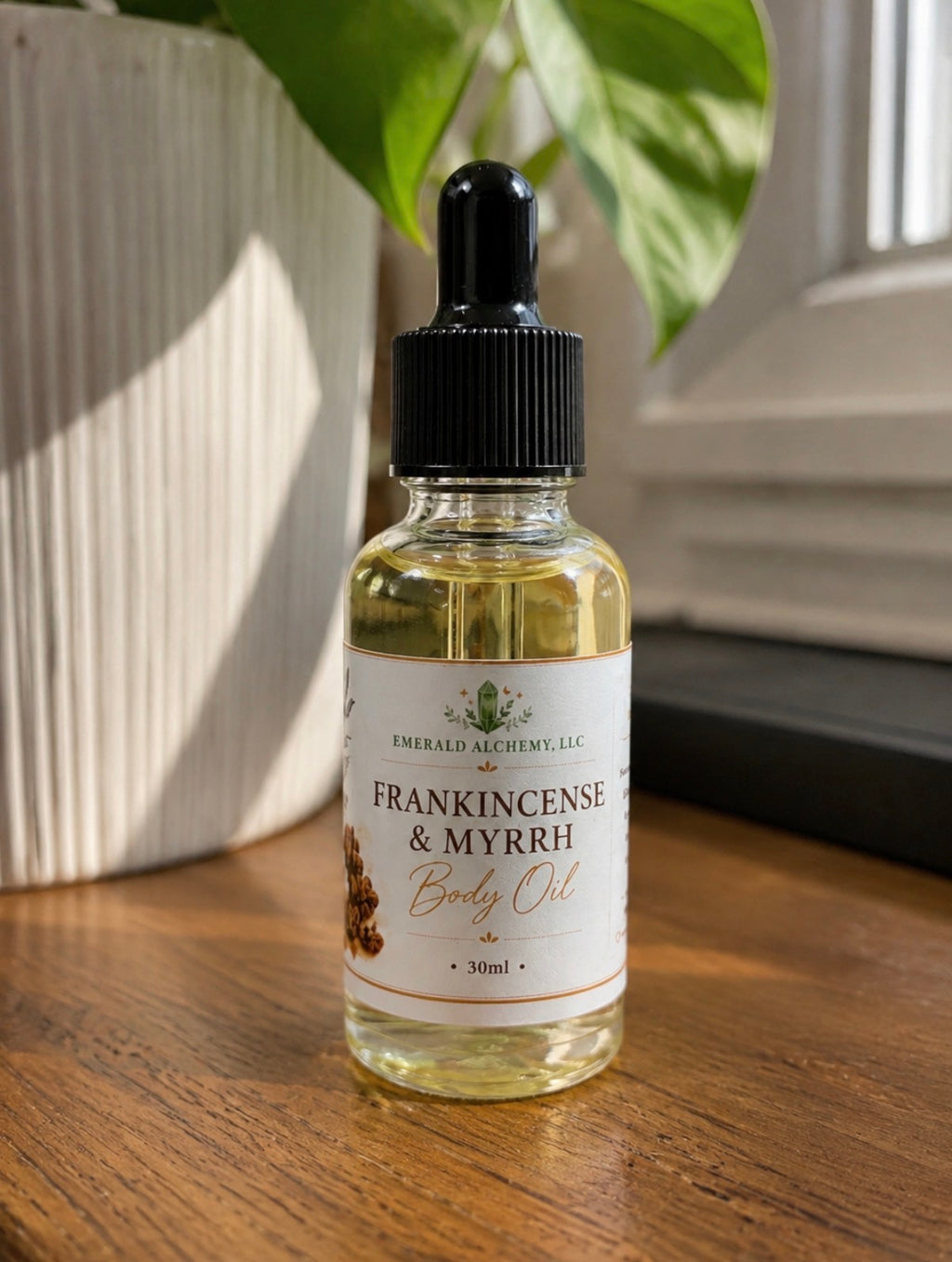 Frankincense and Myrrh Body Oil in a 1 oz dropper bottle