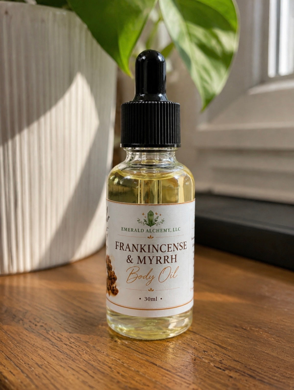 Frankincense and Myrrh Body Oil in a 1 oz dropper bottle