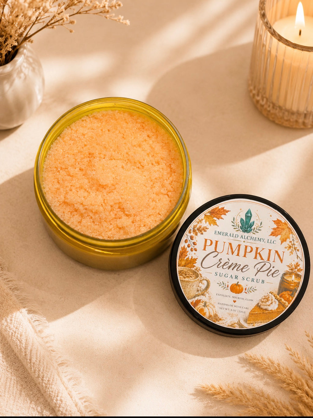 Pumpkin Crème Pie Sugar Scrub 8 oz by Emerald Alchemy with open jar and autumn label